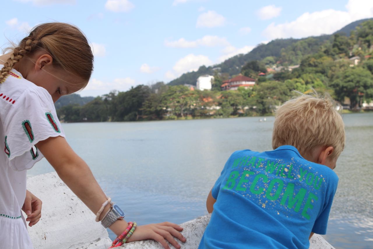 Kids on River Wall in Kandy